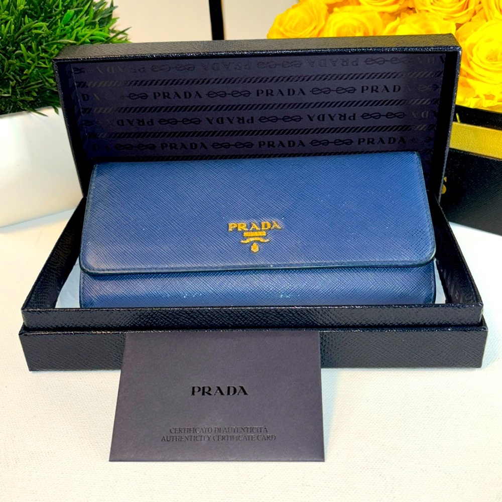 Blue Prada wallet with box and papers